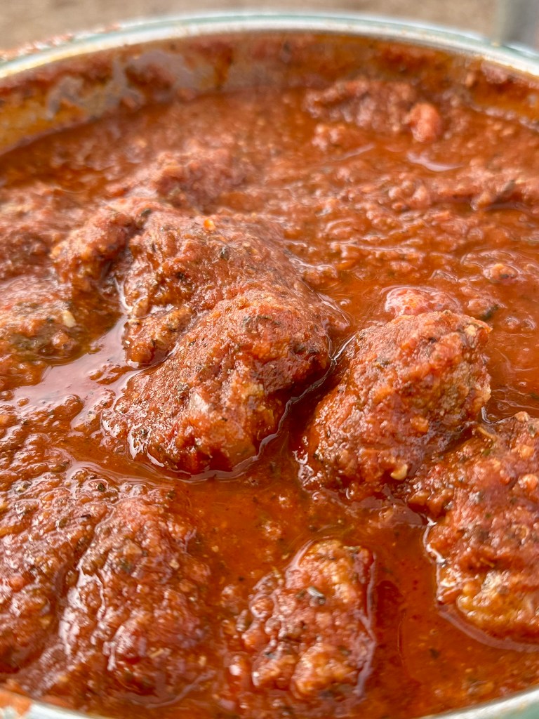 Italian meatballs in marinara - served on a brioche bun with provolone